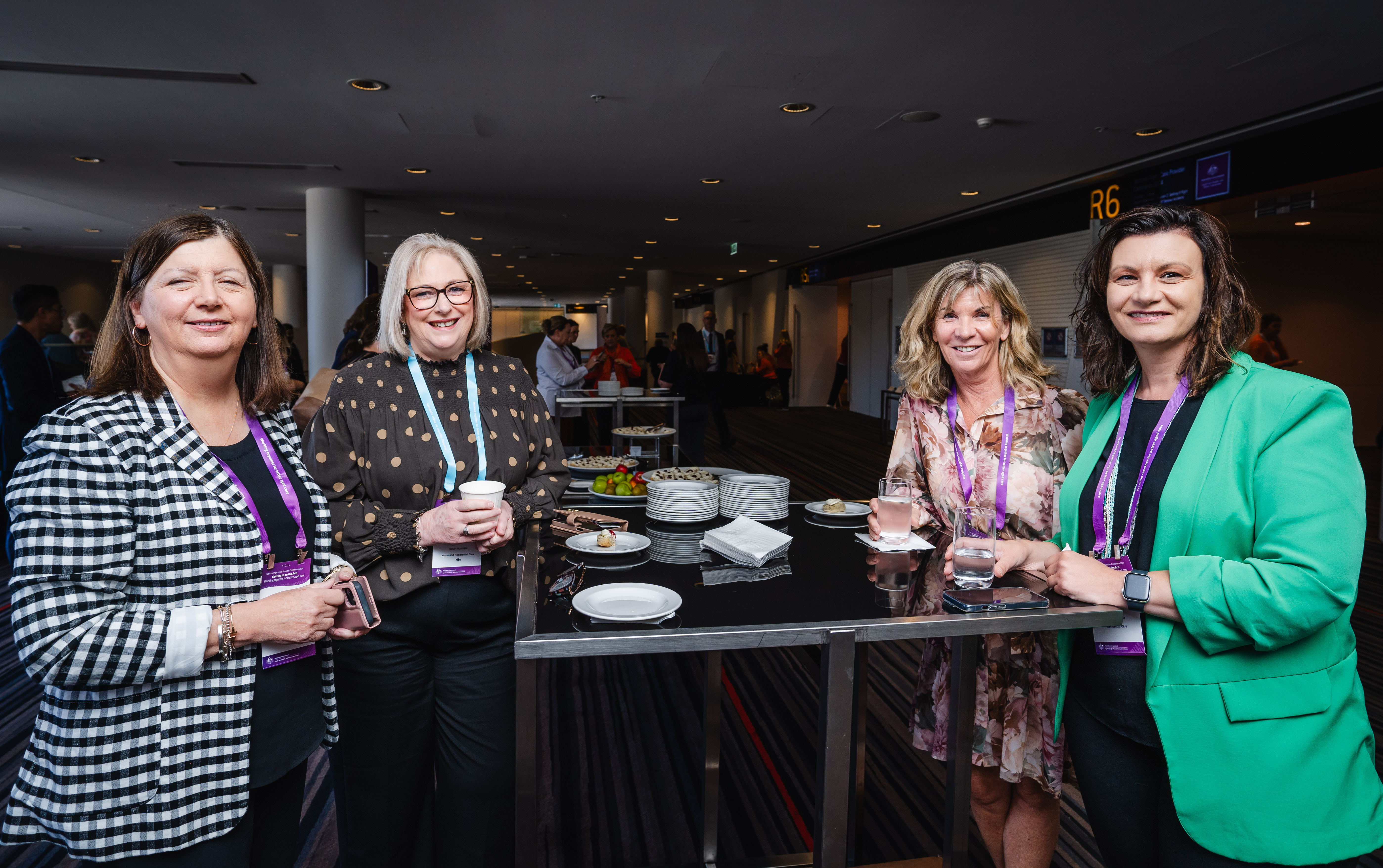 Conference attendees out of session at morning tea